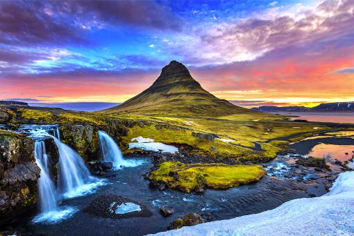 A photo of Kirkjufell at sunrise in Iceland.