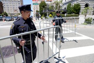 SAN FRANCISCO, CALIFORNIA - JUNE 20: San Francisco police place barriers along California Street as the presidential motorcade prepares to depart the Fairmont Hotel in San Francisco, Calif., on Tuesday, June 20, 2023. (Jane Tyska/Digital First Media/East Bay Times via Getty Images)