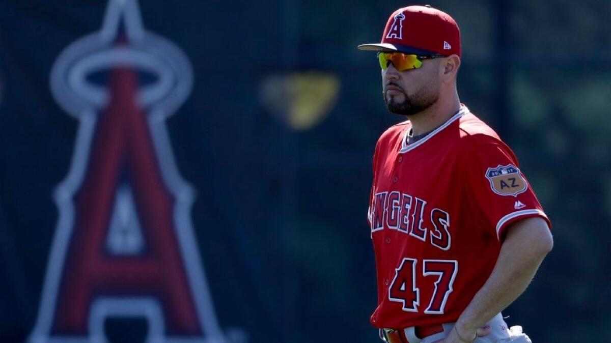 Angels starting pitcher Ricky Nolasco watches during spring training in Tempe, Ariz., on Feb. 15.