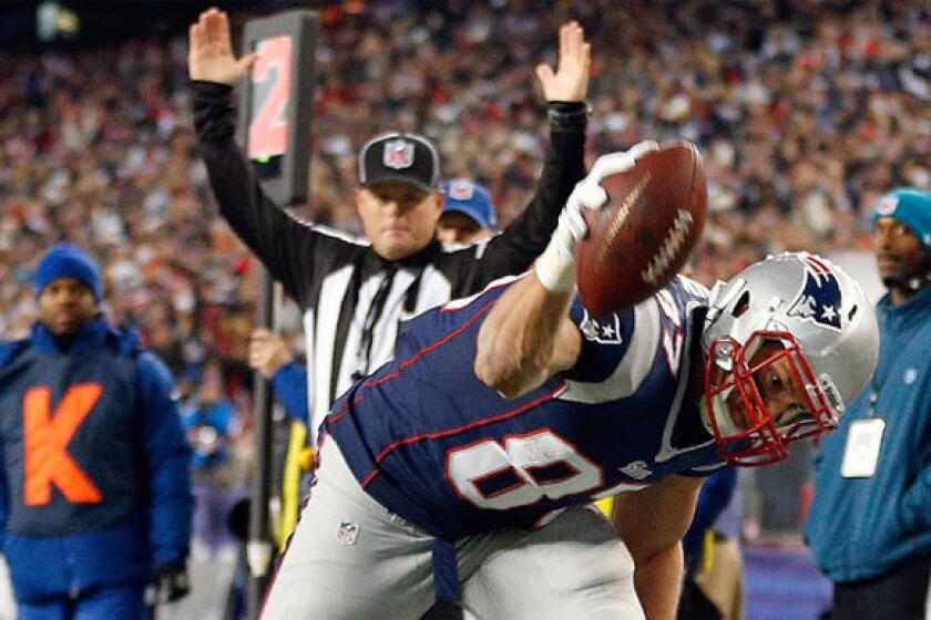 New England tight end Rob Gronkowski celebrates one of his two touchdowns against the Indianapolis Colts before breaking his forearm.