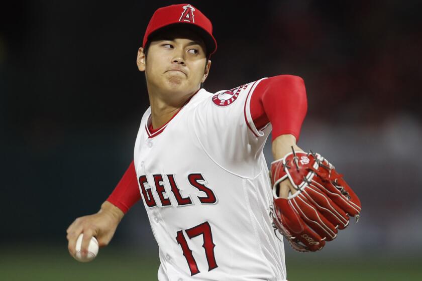 ANAHEIM, CALIF. -- TUESDAY, APRIL 17, 2018: Angles starting pitcher Shohei Ohtani delivers a pitch in the second inning against the Boston Red Sox in Anaheim, Calif., on April 17, 2018. (Allen J. Schaben / Los Angeles Times)