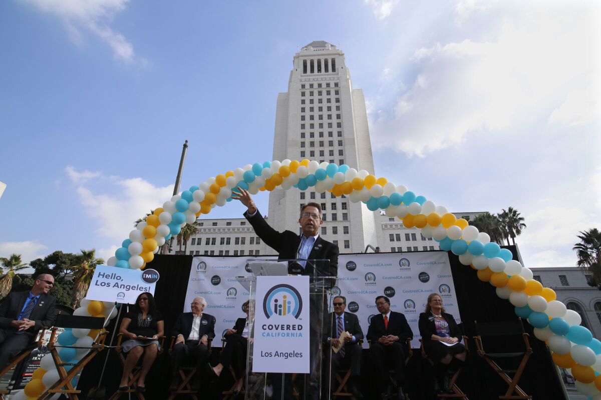 Peter Lee, head of California's ACA exchange, speaking in front of Los Angeles City Hall in November as the exchange launched its second year of enrollment.