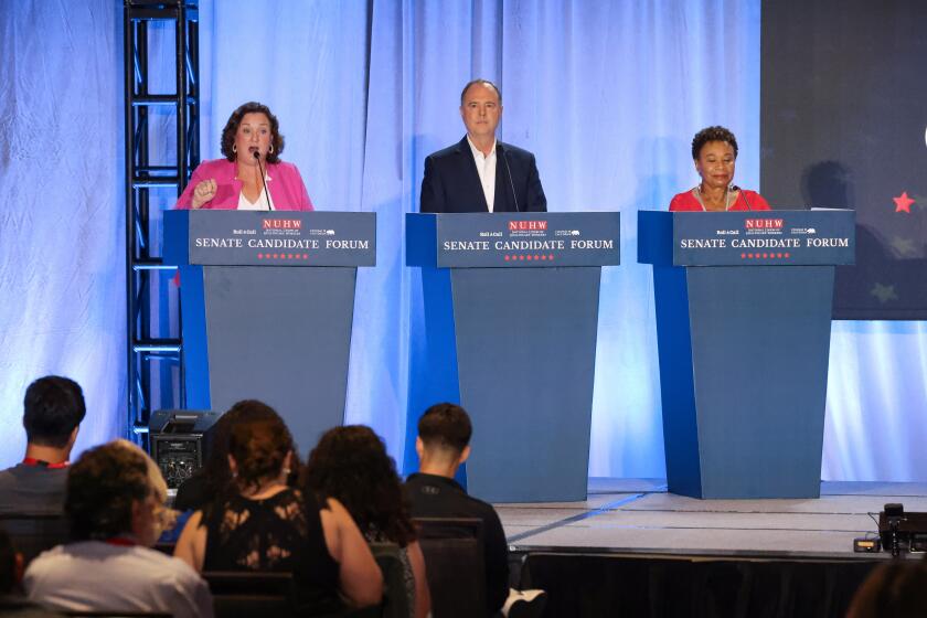 Los Angeles, CA - October 08: Rep. Katie Porter, Rep. Adam Schiff, and Rep. Barbara Lee, left to right participate in a debate on stage with other democrats who are running to succeed Sen. Feinstein at Westing Bonaventure Hotel on Sunday, Oct. 8, 2023 in Los Angeles, CA. (Dania Maxwell / Los Angeles Times)