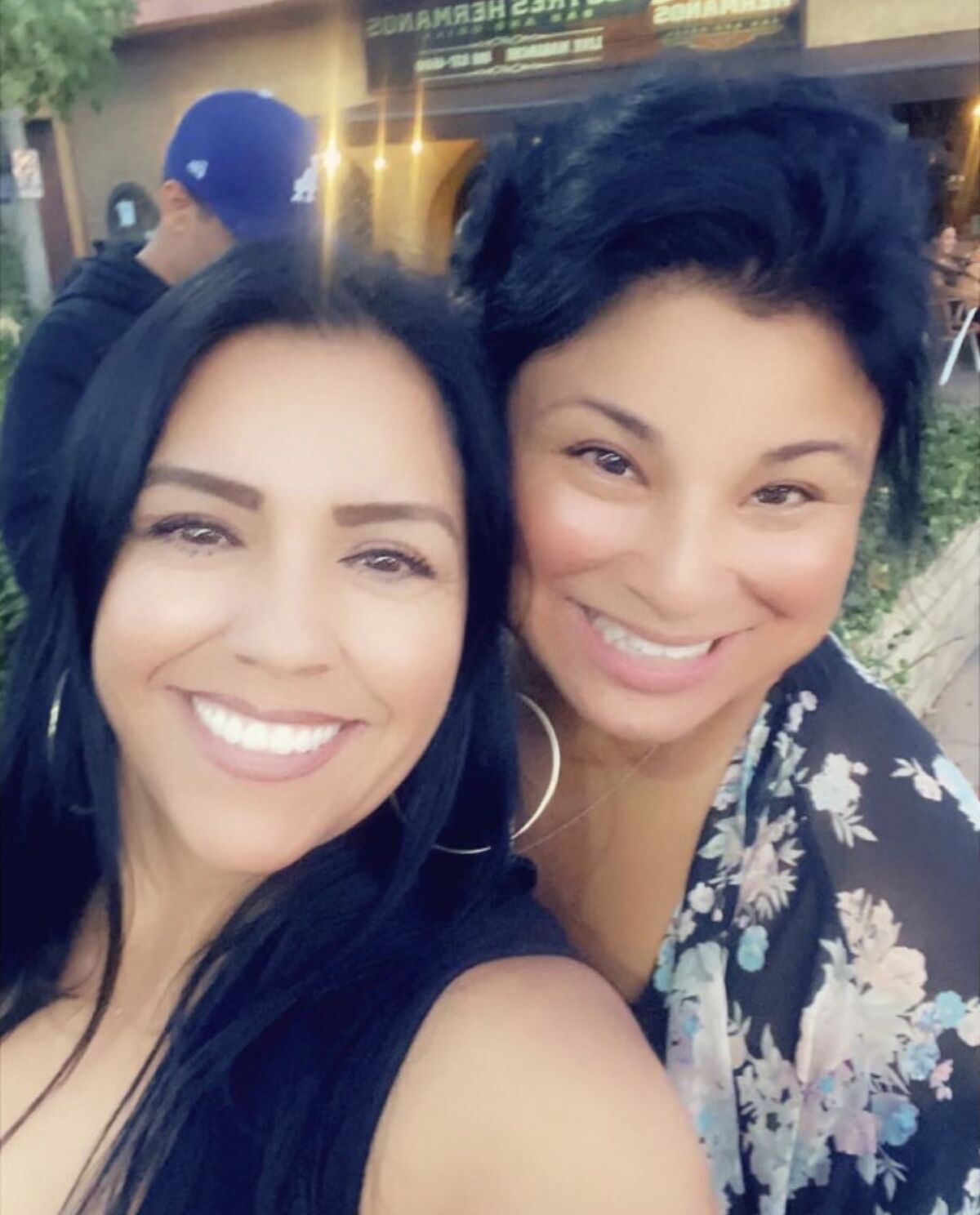 Two women smiling