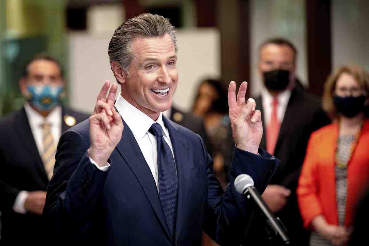 California Gov. Gavin Newsom makes a gesture as he speaks during a news conference on Aug. 6, 2021. 