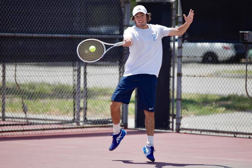 Senior Aidan Adam won two sets at No. 3 singles for Palisades en route to winning a 14th consecutive City team title.