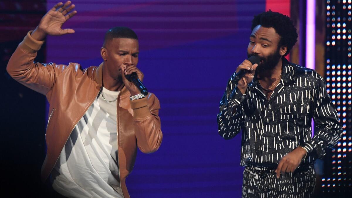 Jamie Foxx, left, and Donald Glover onstage at the BET Awards in Los Angeles.