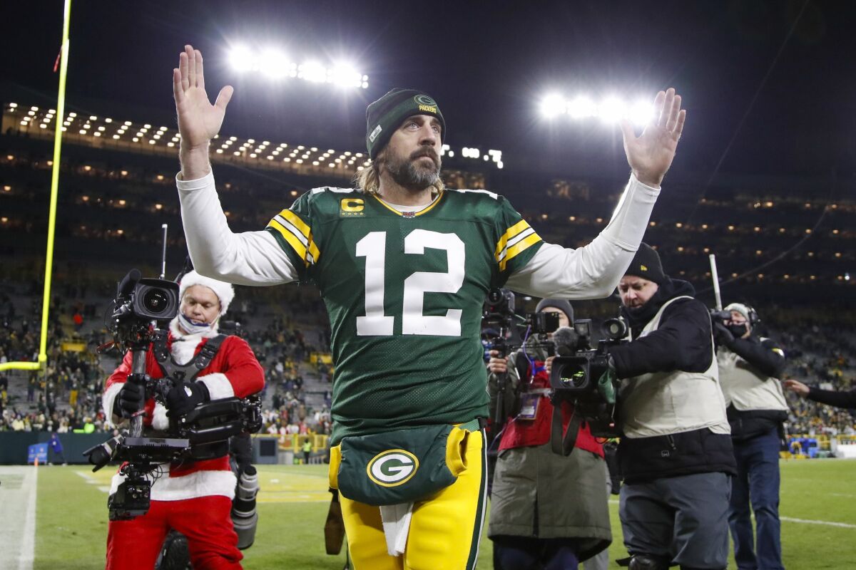 Green Bay Packers' Aaron Rodgers celebrates after an NFL football game.