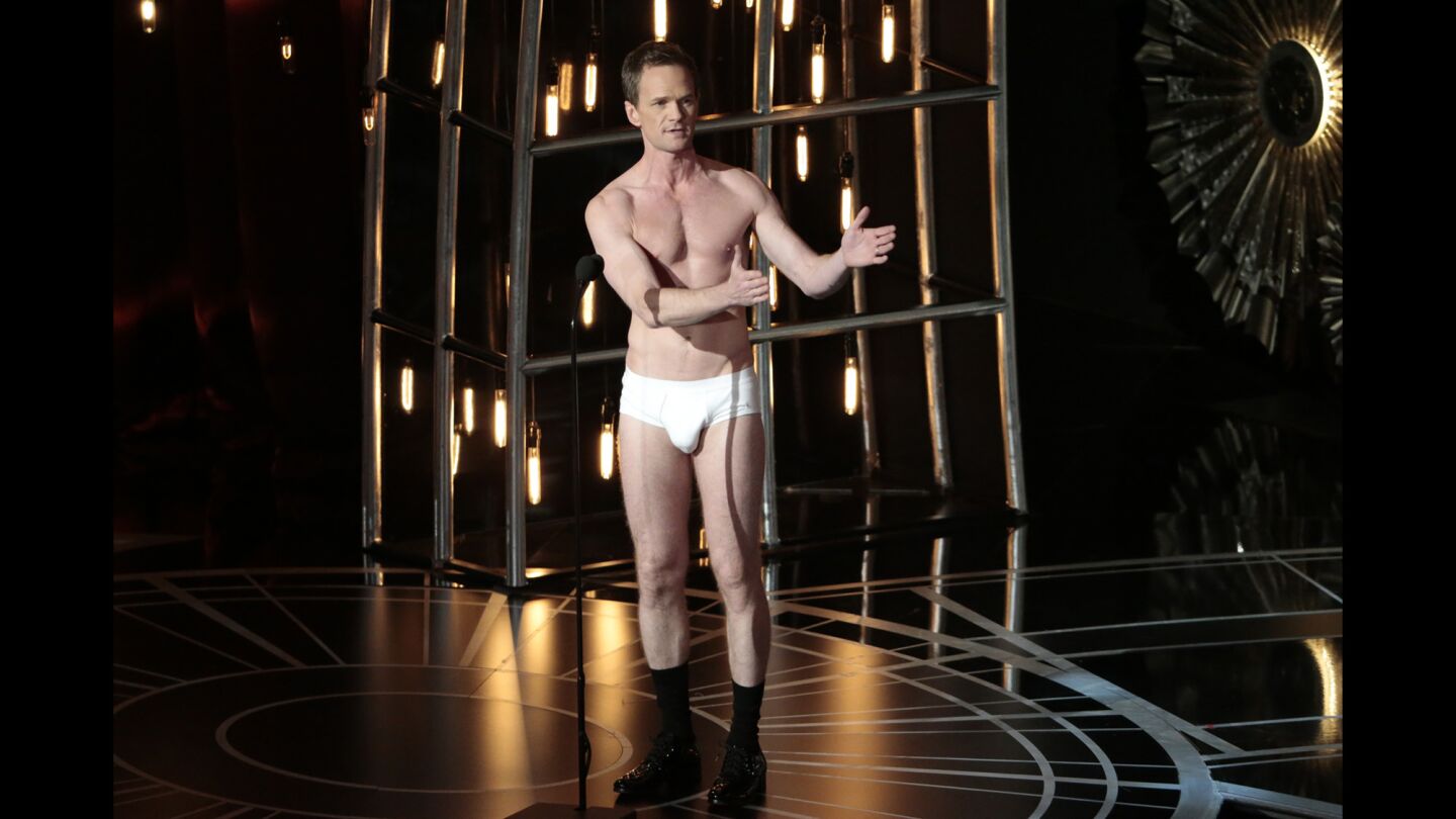 Neil Patrick Harris bares almost all