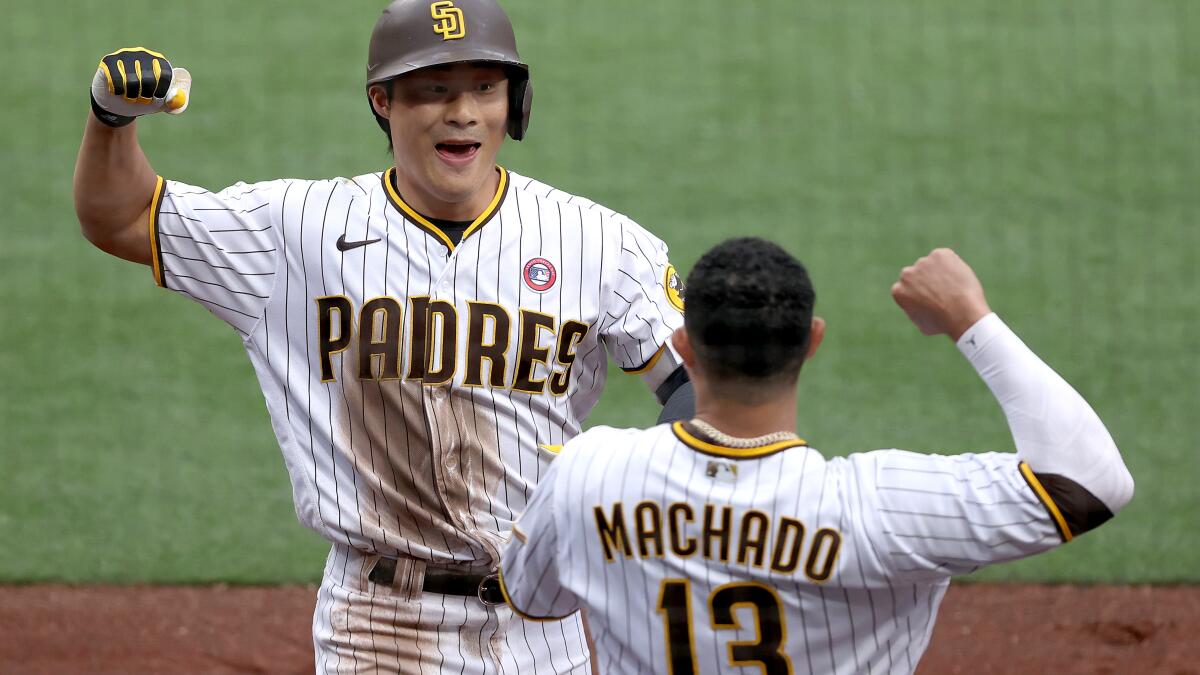 Austin Nola, Jurickson Profar, and Ha-Seong Kim of the San Diego News  Photo - Getty Images