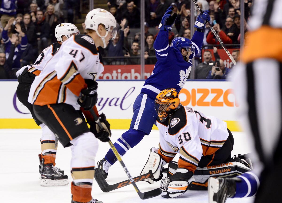 The Maple Leafs' John Tavares celebrates his overtime game winner against goalie Ryan Miller and the Ducks on Feb. 7, 2020.