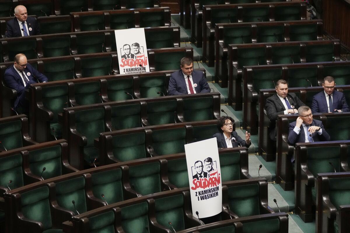 Posters with images on seats in Parliament 