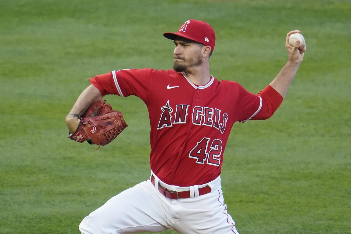 Angels starting pitcher Andrew Heaney delivers against the Minnesota Twins on April 16.