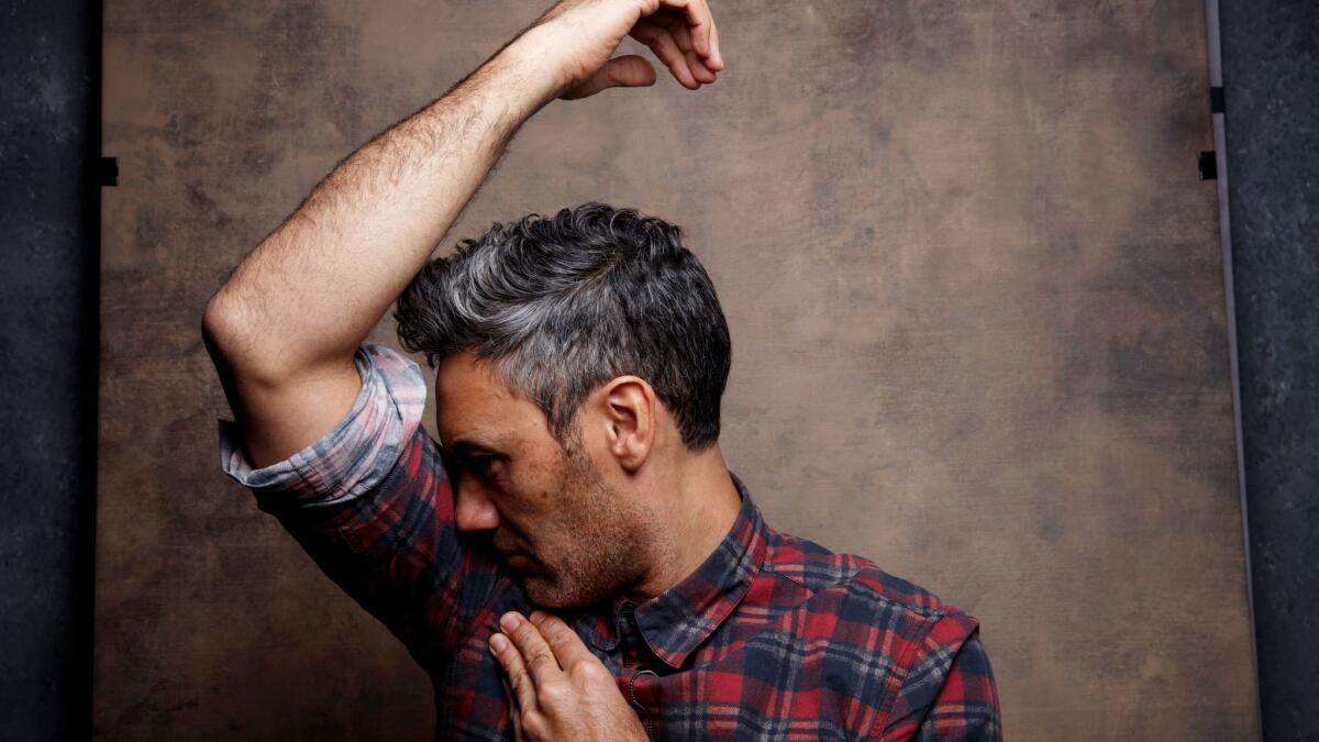 Taika Waititi, director of "Thor: Ragnarok," checks his freshness in the L.A. Times photo and video studio at the Sundance Film Festival in January.