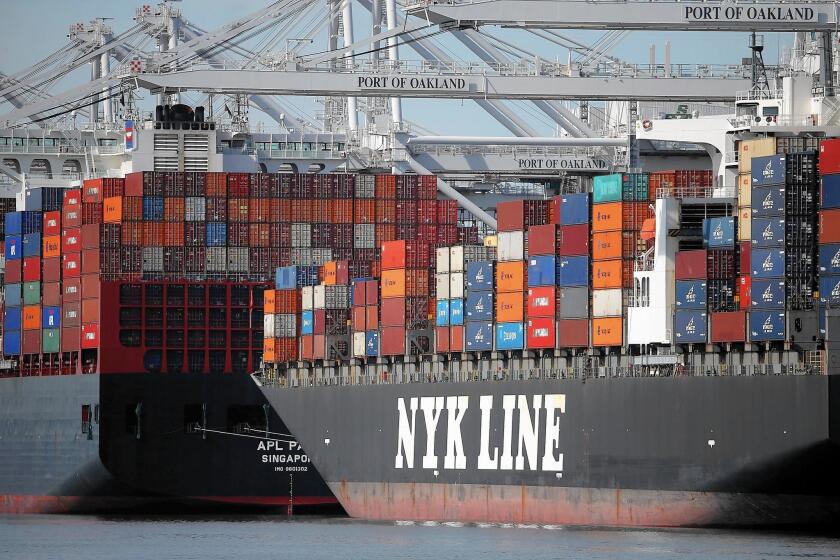 Container ships are stuck in Oakland after talks stalled over fate of arbitrator. “It’s crazy, and you can quote me,” L.A. Mayor Eric Garcetti said.