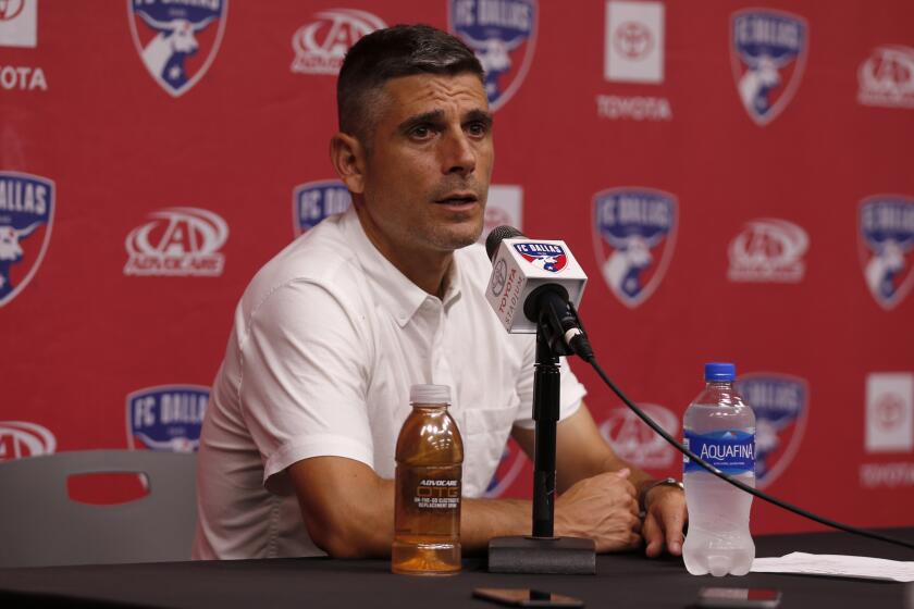 FC Dallas head coach Luchi Gonzalez answers questions during a press conference.