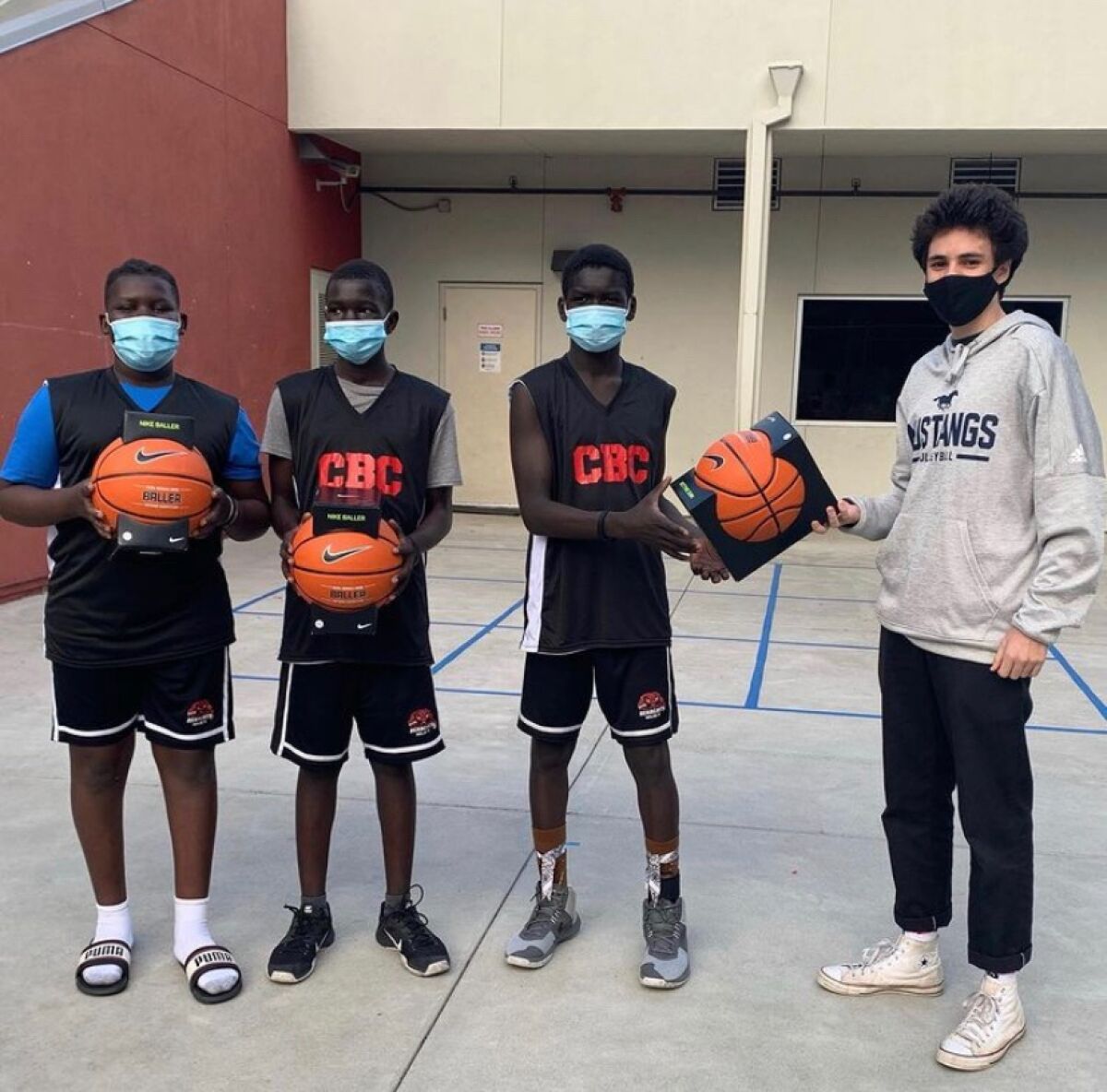 In the fall, San Dieguito student Marco Alvarez was able to donate basketballs to young California Bearcat players.