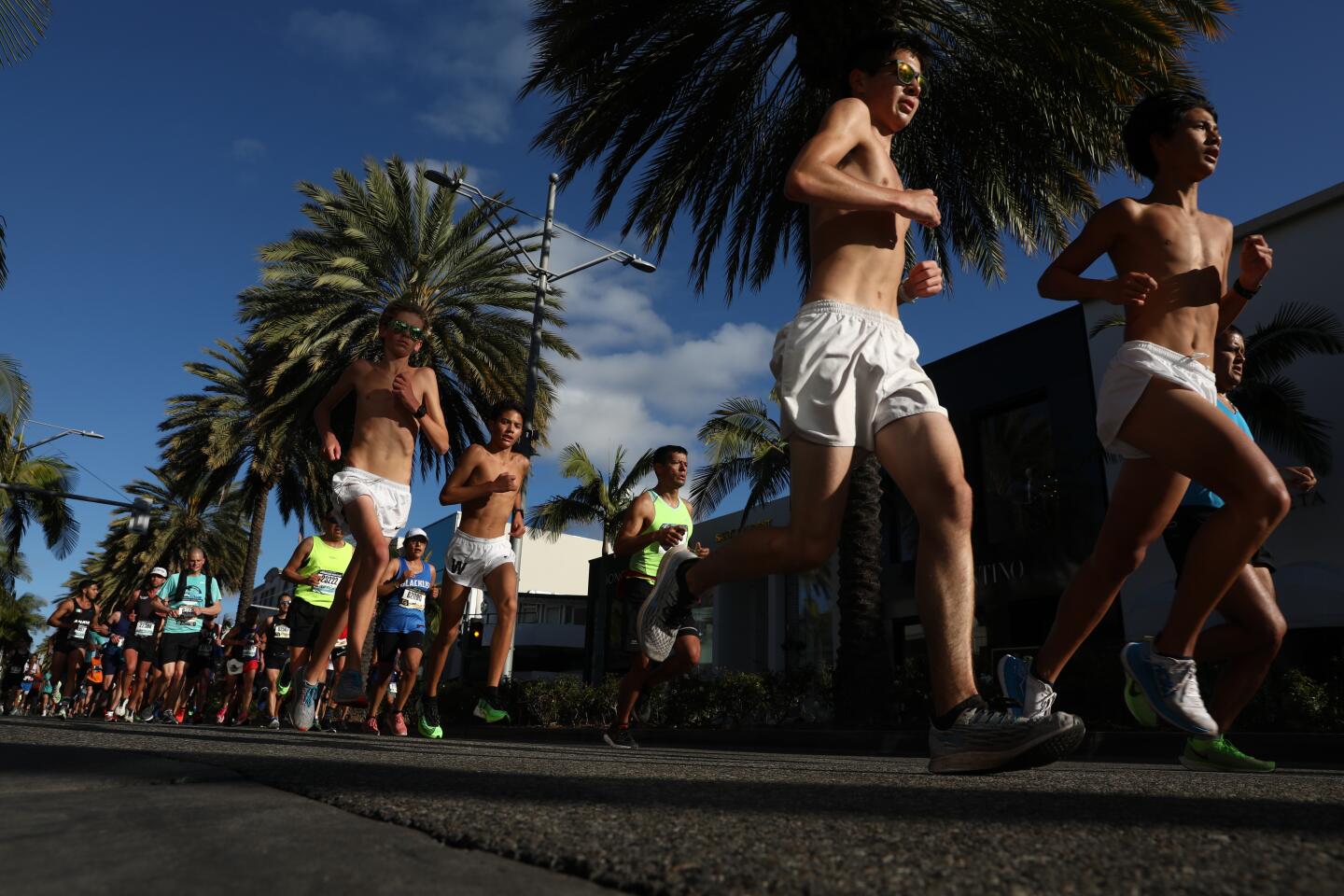 Runners during the 2020 L.A. Marathon on Sunday in Beverly Hills.