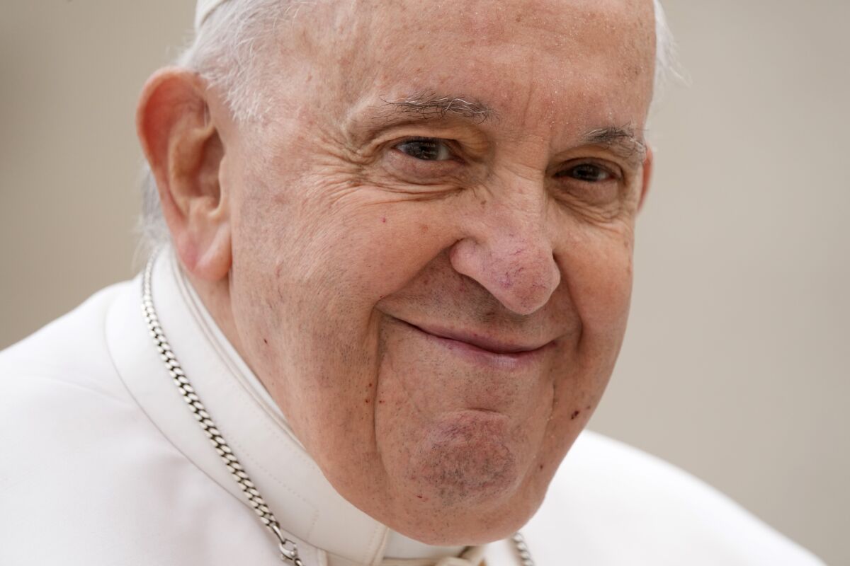 A closeup of Pope Francis smiling