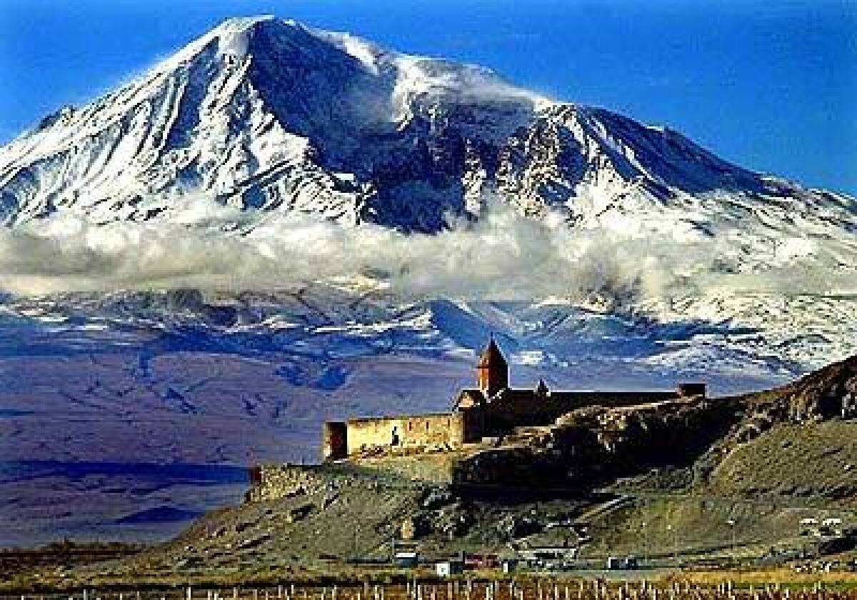 Mt. Ararat, sacred to Armenians, rises behind the ancient monastery of Khor Virab on the border of Turkey and Armenia.