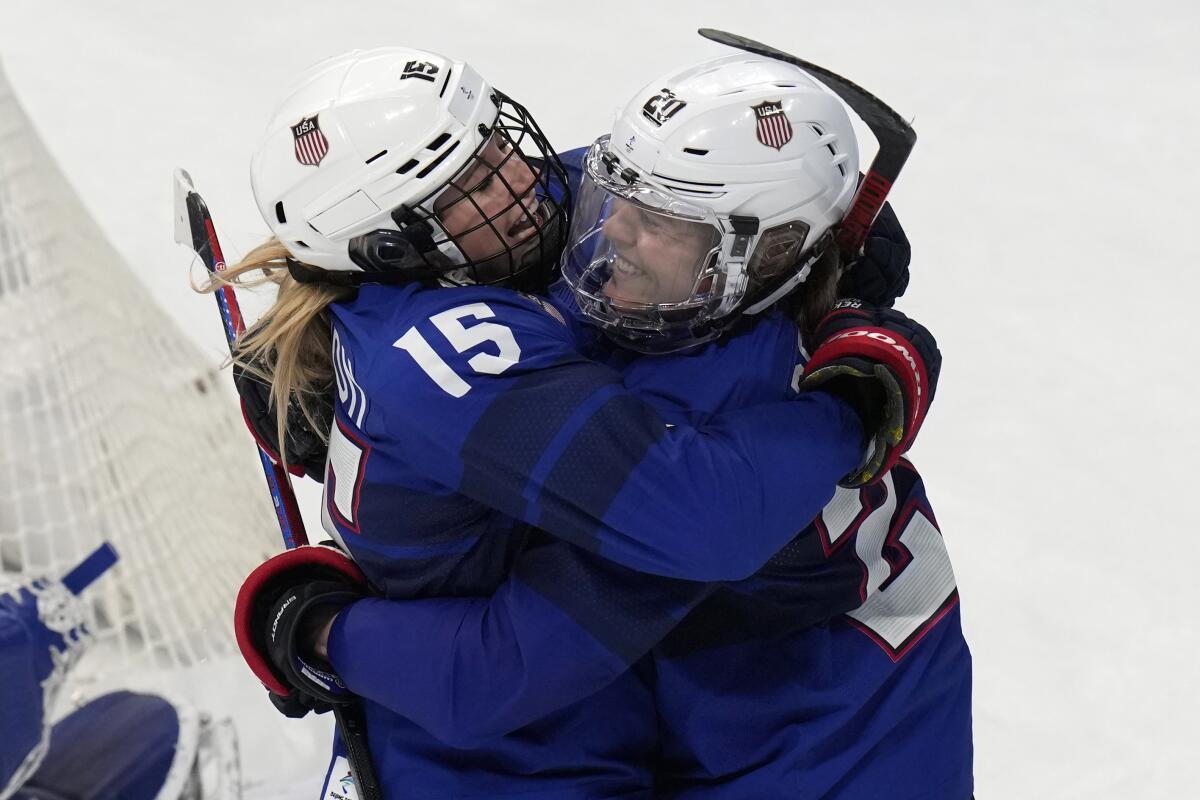 Savannah Harmon (15) of the U.S. celebrates her goal with teammate Hannah Brandt.