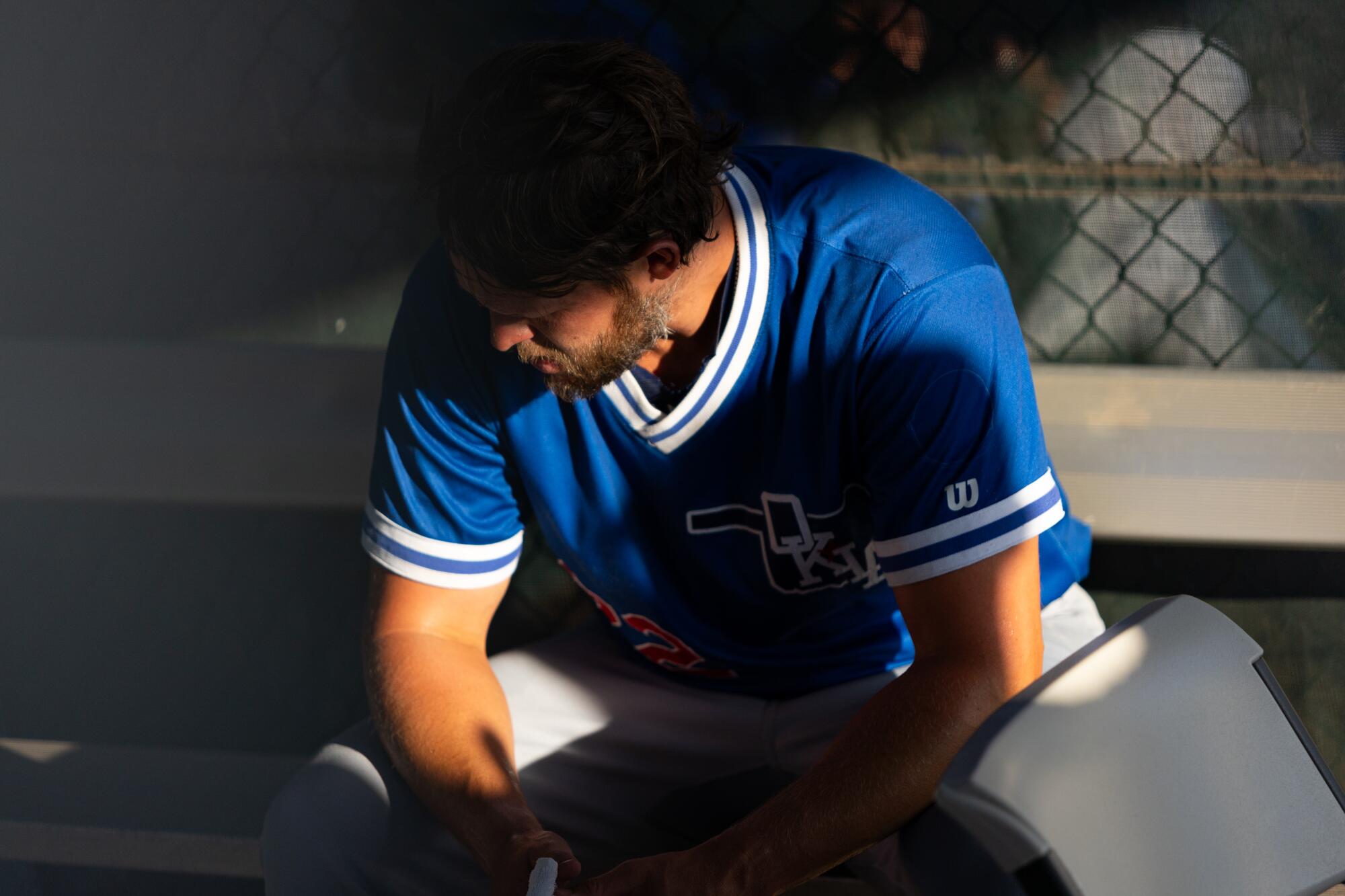 Clayton Kershaw sits before his rehab start for Oklahoma City in Round Rock, Texas, last Friday.