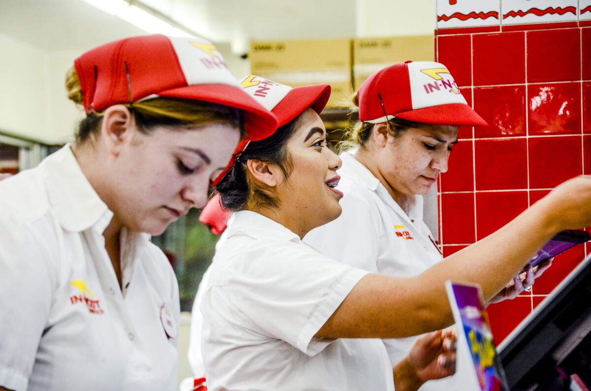 Workers at the flagship In-N-Out Burger in Baldwin Park