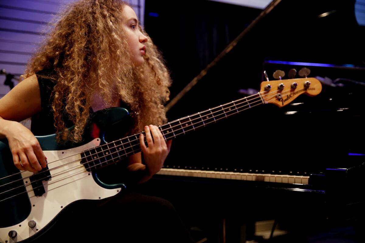 Australian bass guitarist Tal Wilkenfeld works on music in Studio A at Village Studios on December 8, 2016. (Liz O. Baylen / Los Angeles Times)