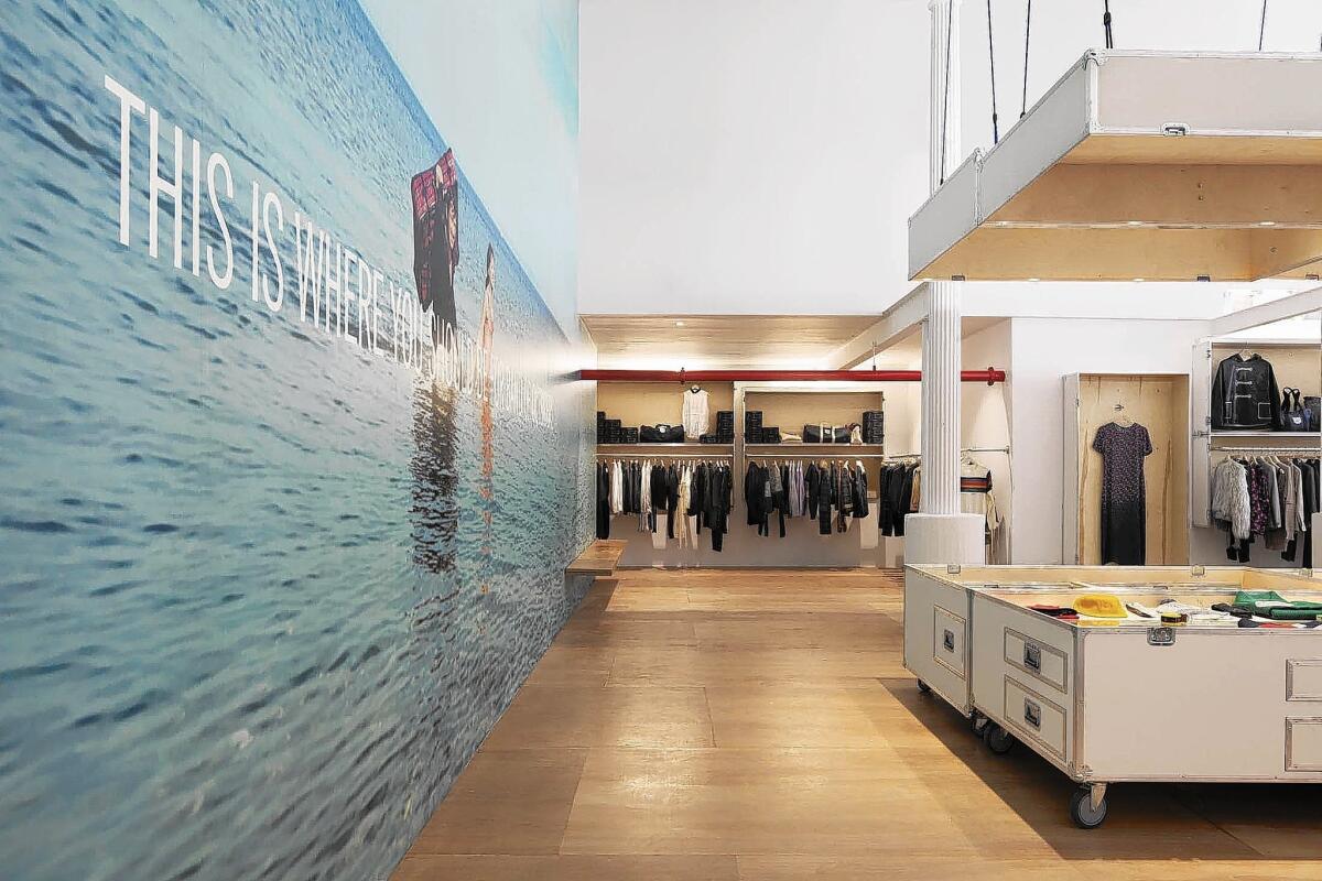 An ocean scene mural at the Band of Outsiders store in SoHo depicts the South of France.