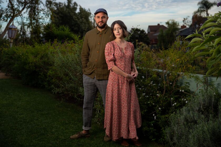 LOS ANGELES, CA - NOVEMBER 20: Director and screenwriter Julia Hart is photographed with her husband, co-screenwriter and producer, Jordan Horowitz, in promotion of their film, "I'm your Woman," in the back yard of their Los Angeles, CA, home, on Friday, Nov. 20, 2020. (Jay L. Clendenin / Los Angeles Times)