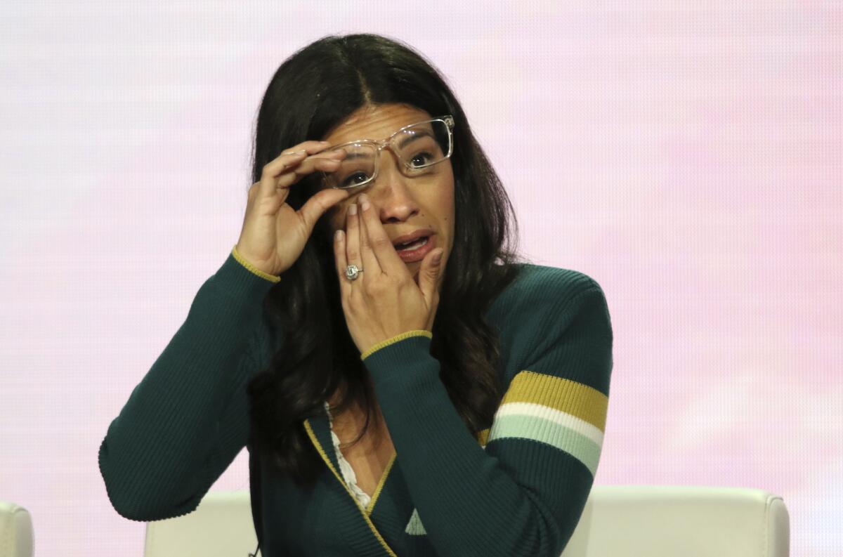 Gina Rodriguez wipes away a tear as she speaks in the "A Final Farewell to 'Jane the Virgin'" panel during the Showtime TCA Winter Press Tour.