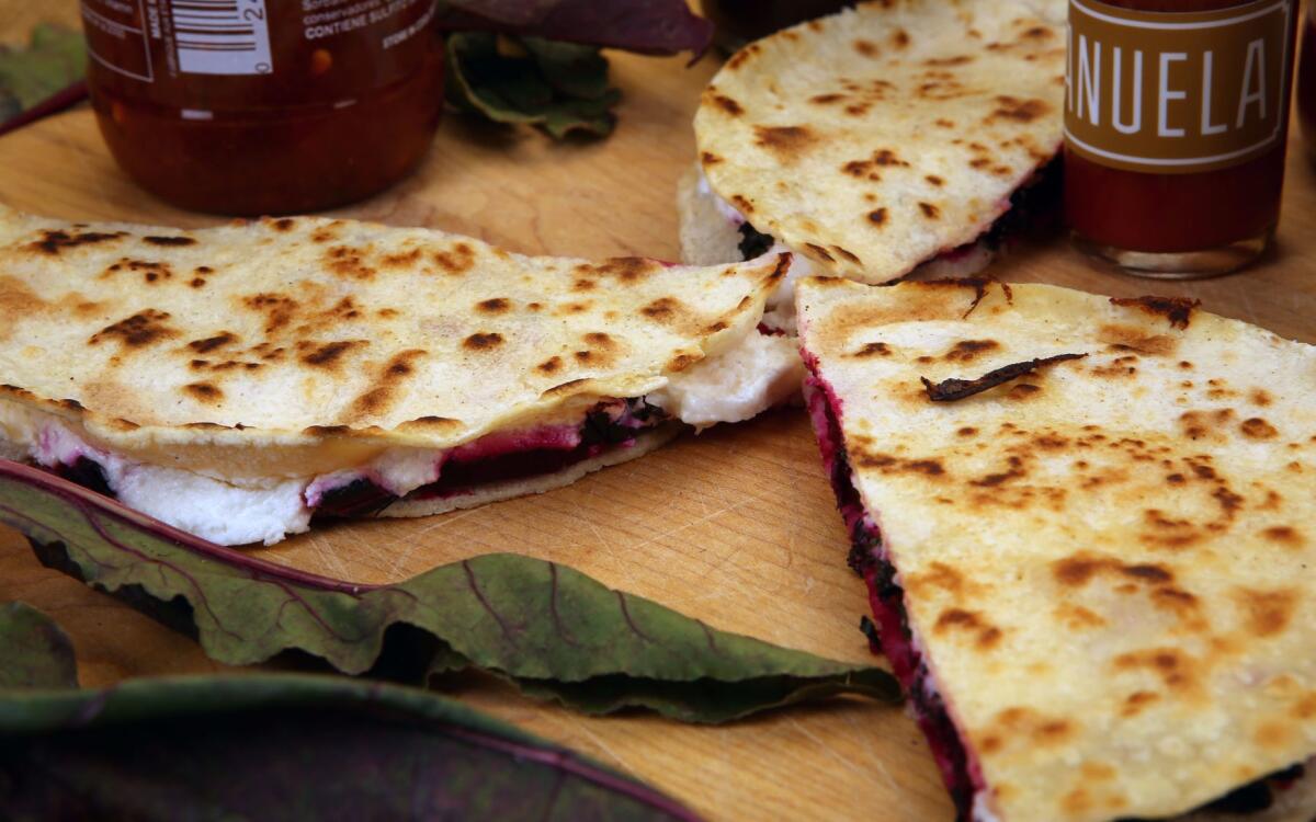 Beet green, roasted beets and goat cheese quesadillas