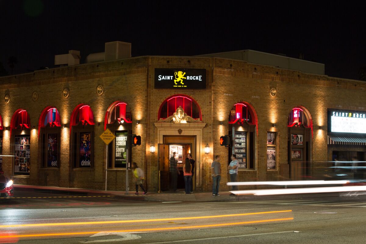 a brick concert venue lit up at night