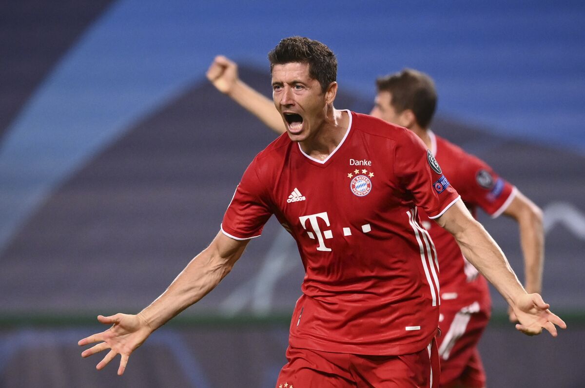 Bayern's Robert Lewandowski celebrates after scoring his side's third goal