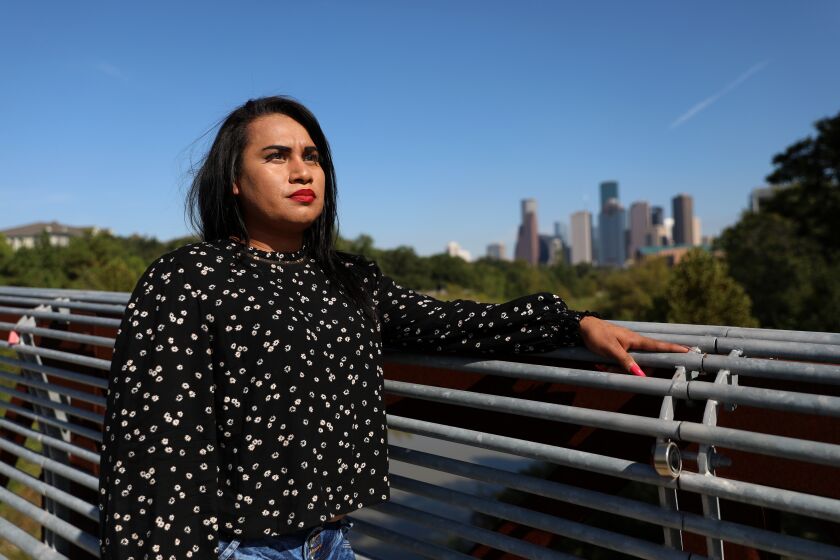 HOUSTON, TEXAS -- SUNDAY, OCTOBER 13, 2019: Mayela Villegas, 26, of San Salvador, El Salvador, a transgender woman, was allowed to pursue her claim for political asylum relocating to live with family members in Houston, Texas, on Oct. 13, 2019. Mayela fled San Salvador after receiving death threats from gangs. Villegas was stranded for two months living in a tent encampment near the Gateway International Bridge at the U.S.-Mexico border in Matamoros, Tamaulipas, Mexico under theTrump administration’s “Remain in Mexico” policy. (Gary Coronado / Los Angeles Times)