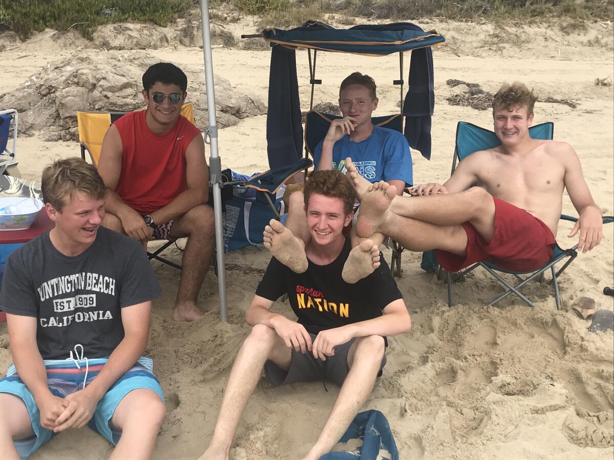 At 16, a good laugh with friends is everything. The boy (in footstool mode) and his buddies. 