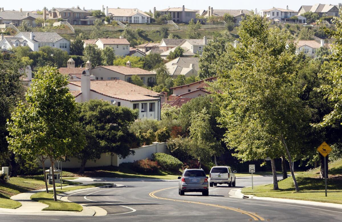 A speed limit sign says 25 mph on Parkway Calabasas near Justin Bieber's mansion, but some neighbors complain that he drives his Ferrari much faster.