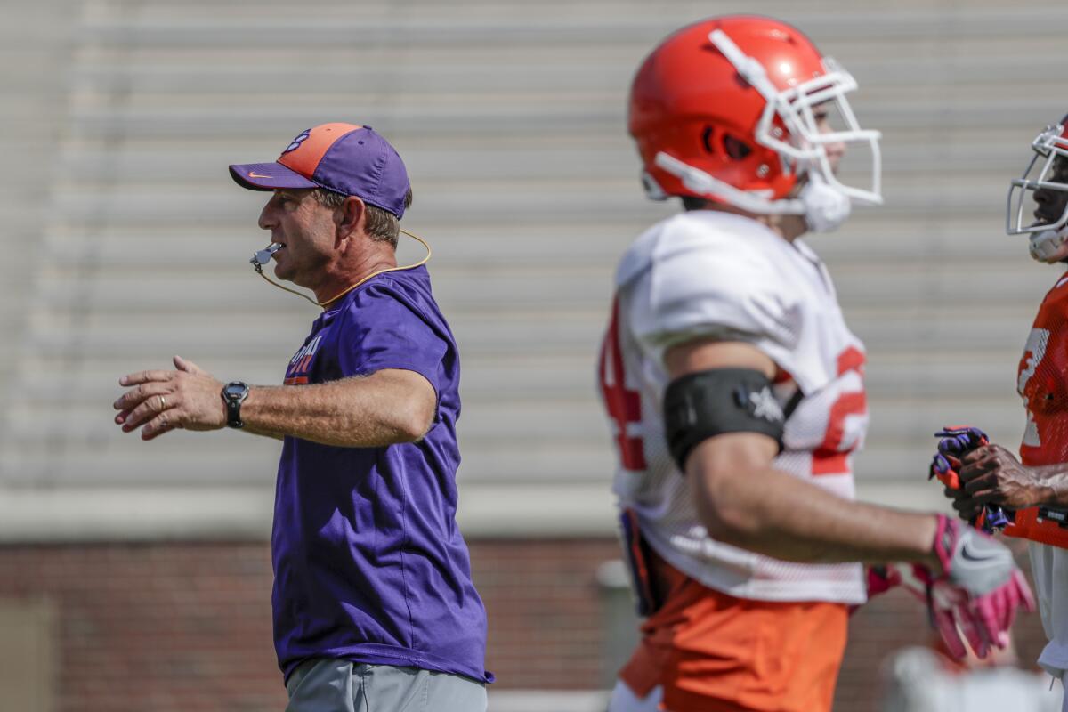 Clemson football coach Dabo Swinney conducts practice.