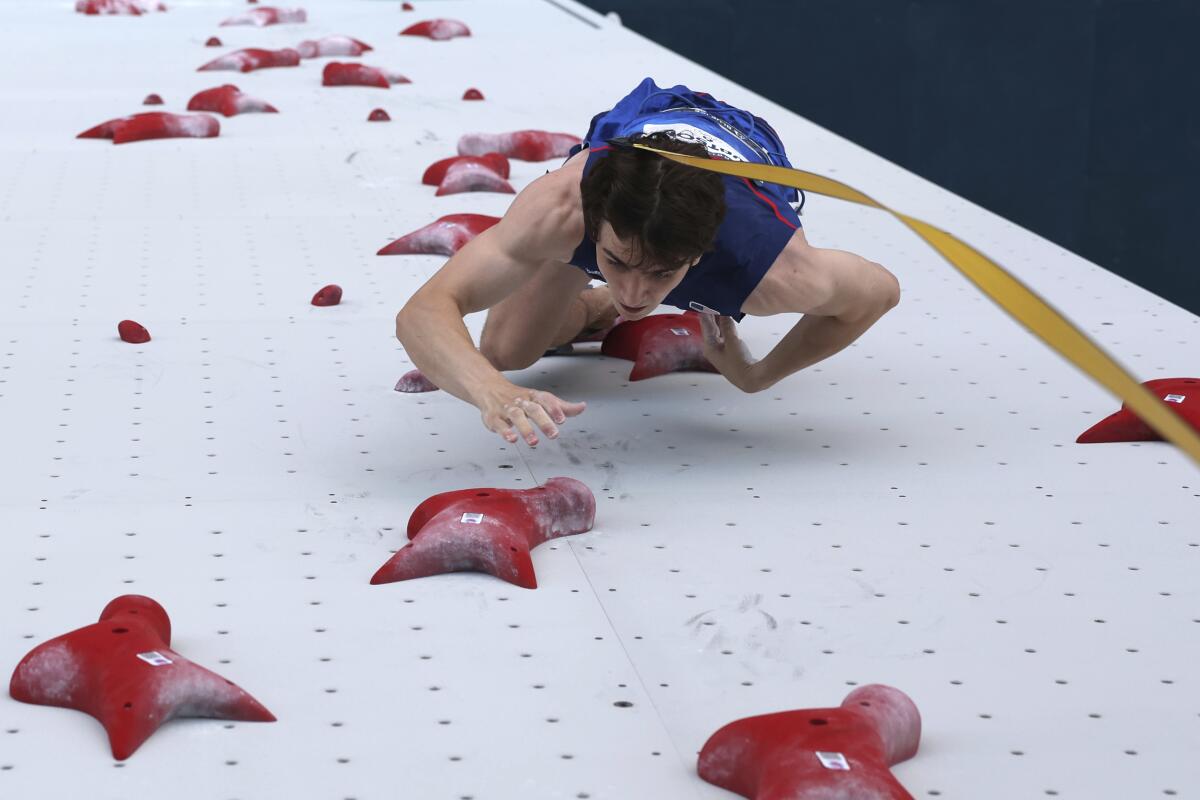 Sam Watson competes in the men's speed climb.