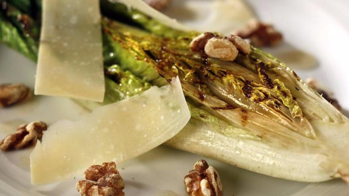 Grilled romaine with walnuts, parmesan and anchovy dressing