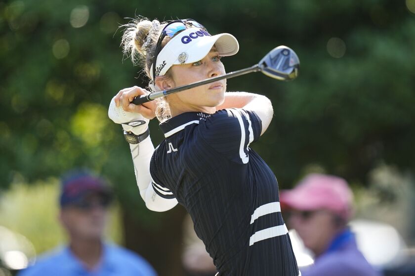 Nelly Korda hits off the nineth tee during the first round of the U.S. Women's Open golf tournament at the Pine Needles Lodge & Golf Club in Southern Pines, N.C. on Thursday, June 2, 2022. (AP Photo/Steve Helber)