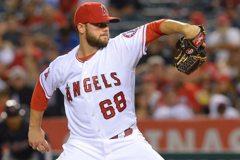 Angels' Cam Bedrosian pitches against Cleveland on June 10.