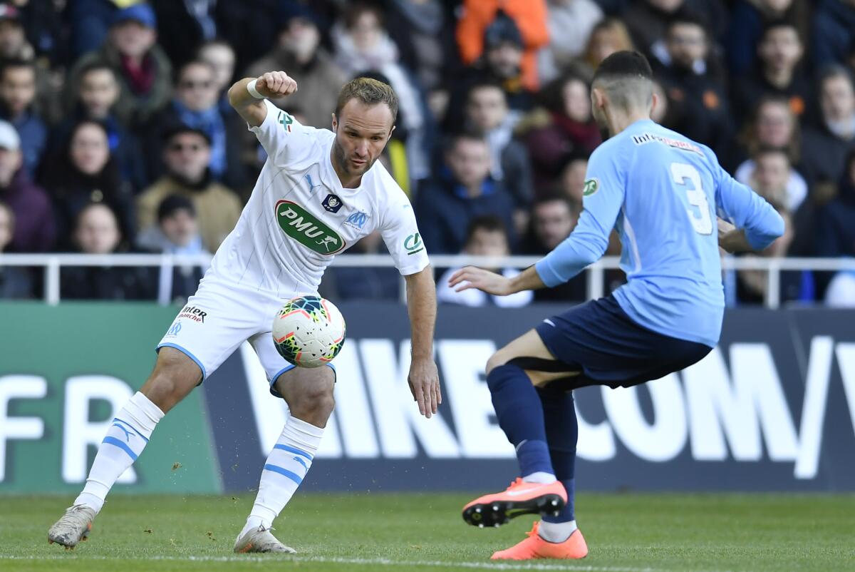 Marseille forward Valere Germain controls the ball during a game against Trelissac on Jan. 5