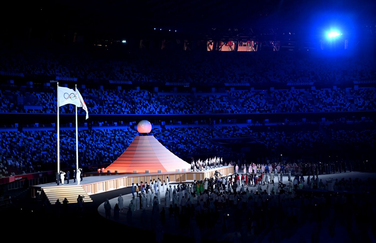 Entertainers perform during opening ceremony at the Tokyo Olympics. 