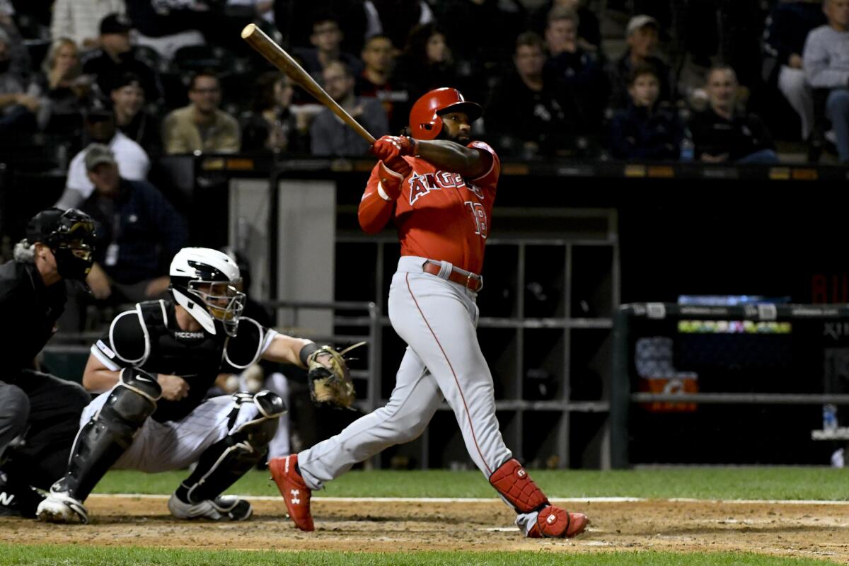 Angels' Brian Goodwin hits a two-run home run off Chicago White Sox's Aaron Bummer during the eighth inning on Friday in Chicago.