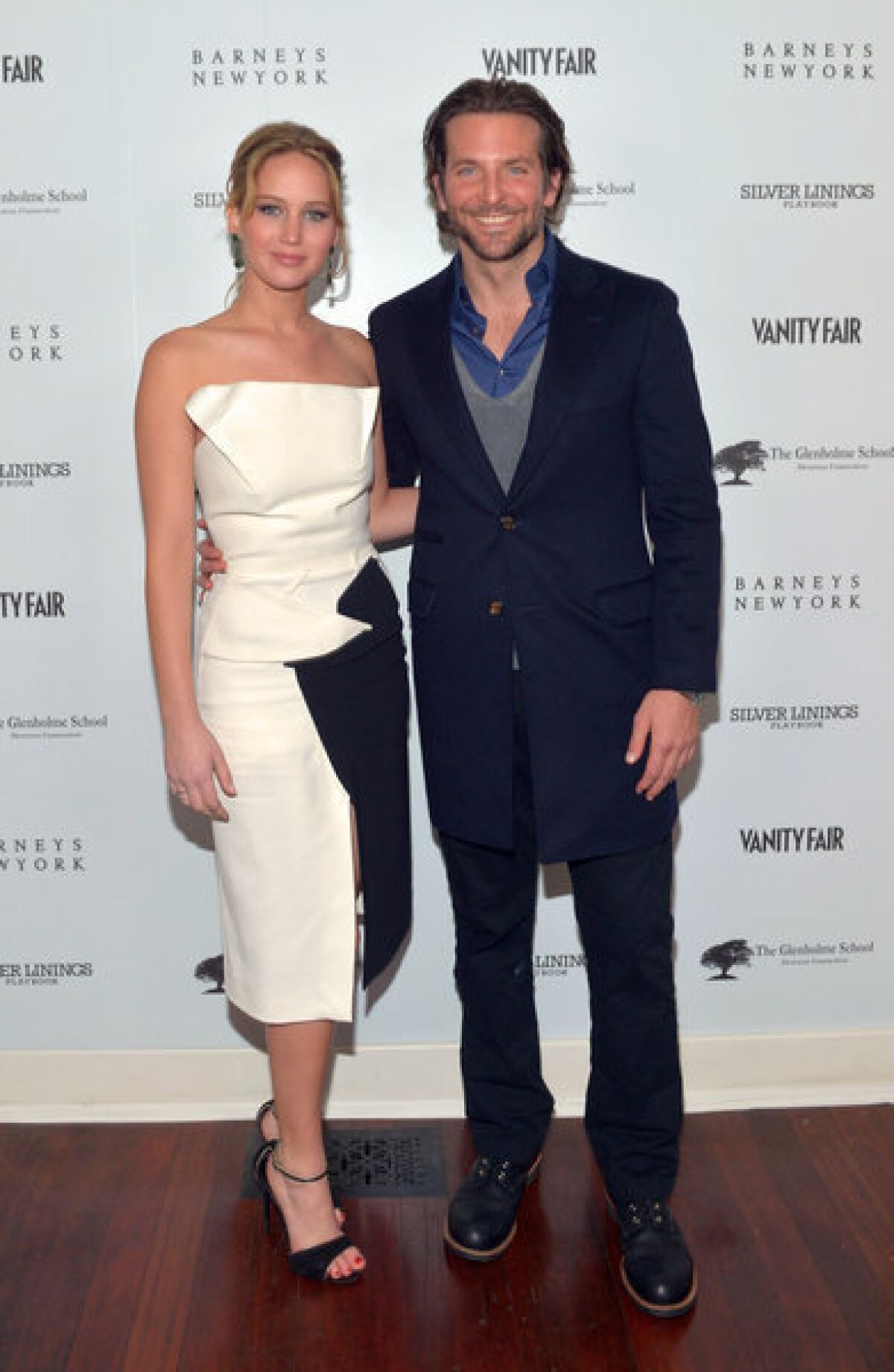 Jennifer Lawrence and Bradley Cooper attend the Vanity Fair, Barneys New York and Weinstein Co. celebration of "Silver Linings Playbook" in support of the Glenholme School on Wednesday in Los Angeles.