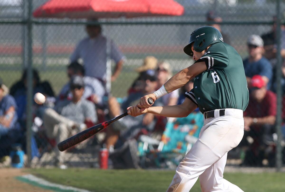 Costa Mesa High's Duke Kirby slugs a stand-up run-scoring double during the semifinals of the CIF Southern Section Division 6 playoffs against Calvary Murrieta at home on Tuesday.