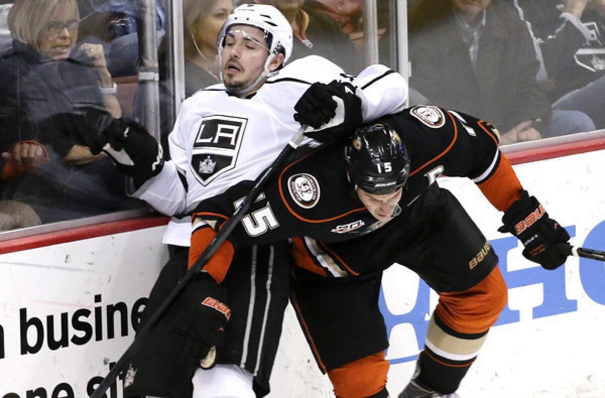 Ducks center Ryan Getzlaf (15) and Kings defenseman Drew Doughty will join forces for Canada during the 2014 Winter Olympics in Sochi, Russia.
