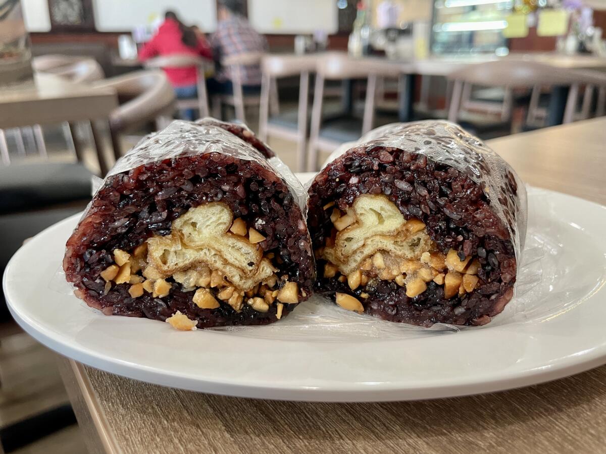 Taiwanese purple rice roll, also known as fan tuan.
