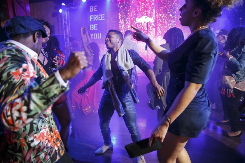Attendees move to the rhythm on the dance floor at Afropunk's Fancy Dress Ball in Los Angeles.